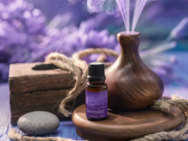 A serene photo capturing the diffusion of lavender essential oil