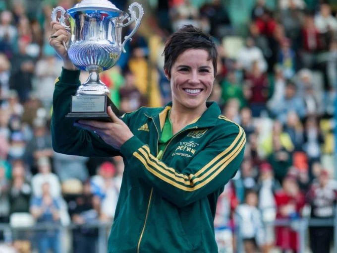 A photo of a victorious athlete celebrating their achievements