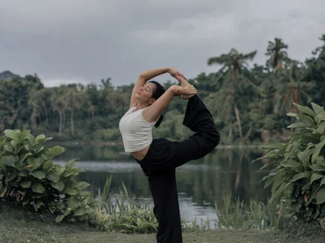 A photo of a woman performing a gentle yoga pose (2)
