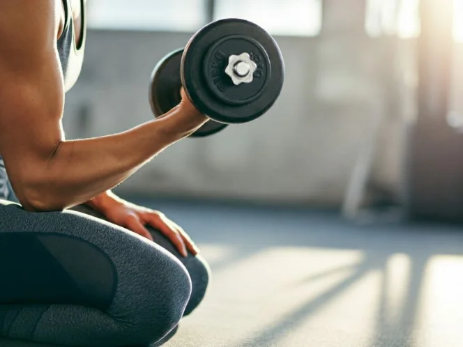 a person performing a dumbbell bicep curl