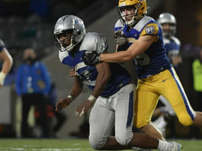 an image of a dynamic action shot of athletes playing a team sport, showcasing the combination of power, agility, and endurance required