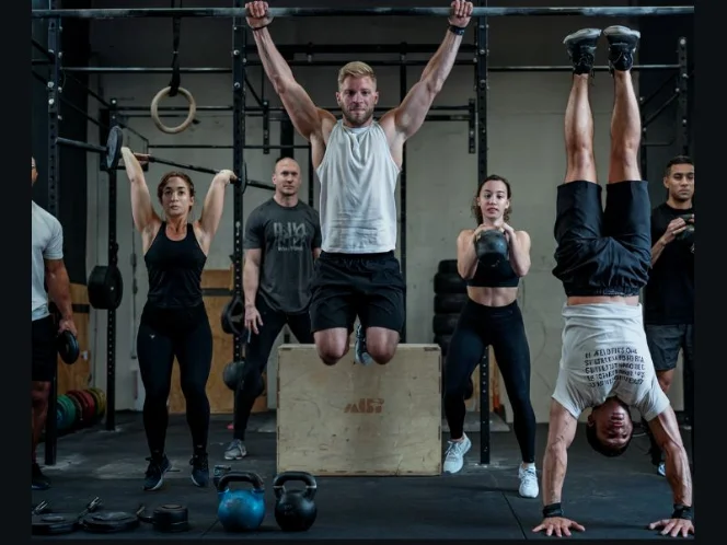a diverse group of people engaging in various functional fitness activities, showcasing its inclusivity and adaptability